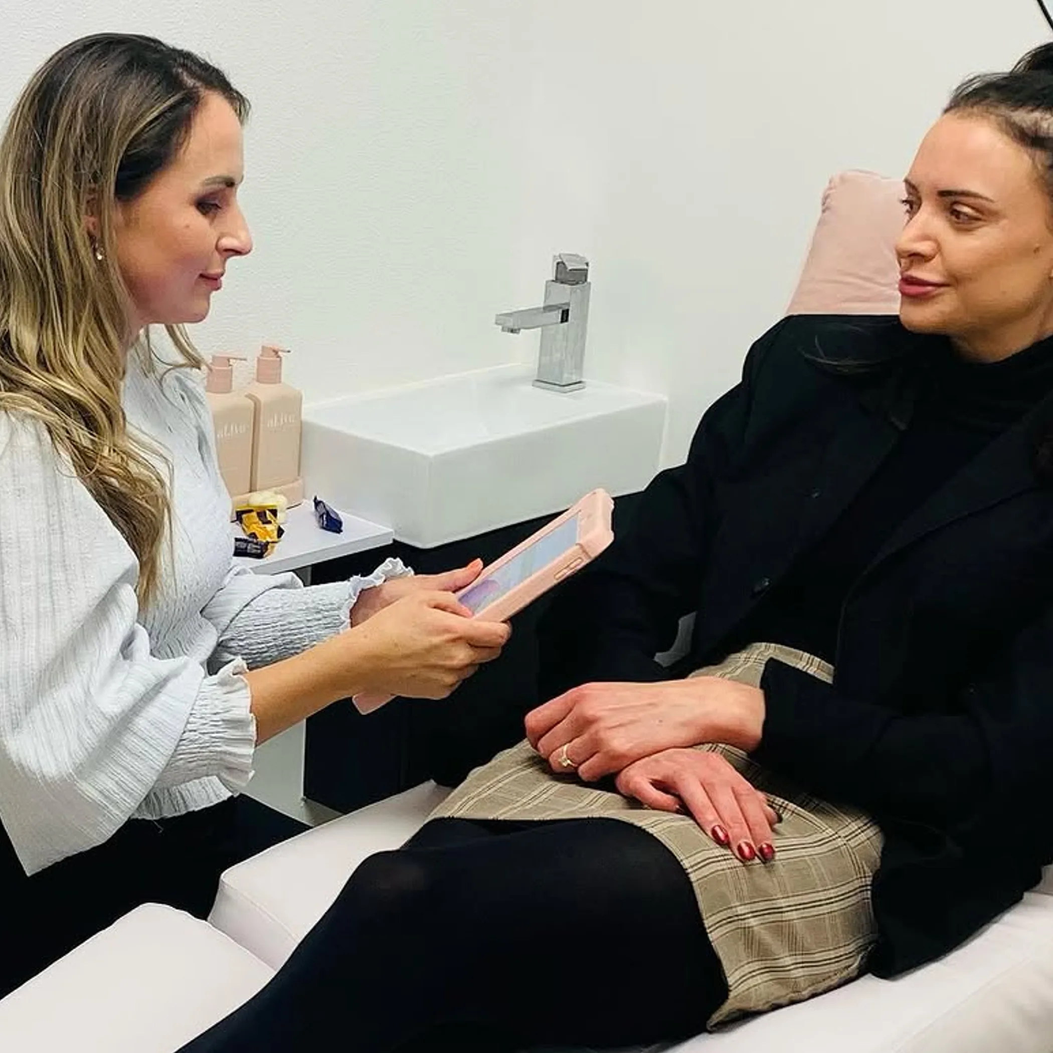 aesthetic specialist consulting with client