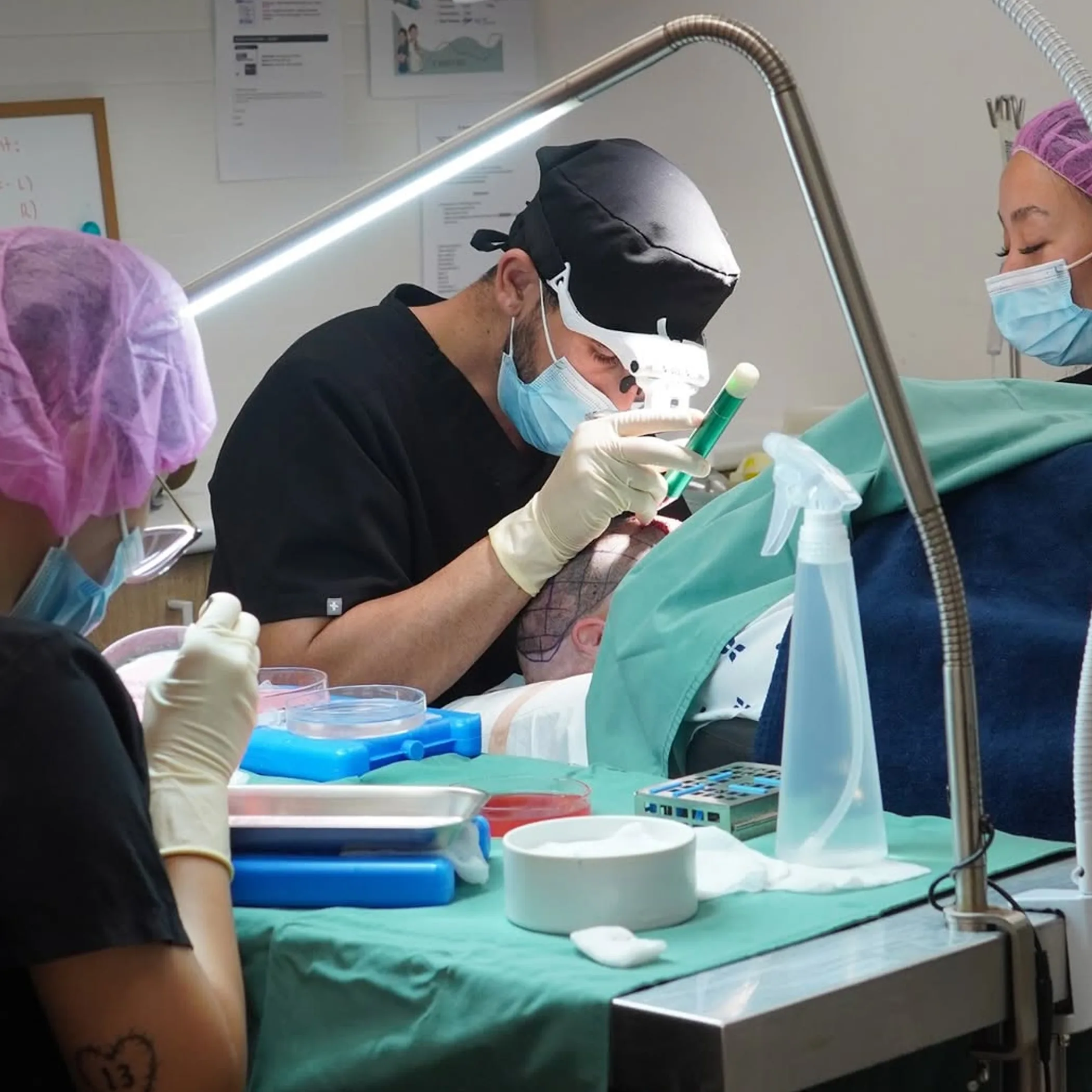 hair restoration procedure with surgical staff