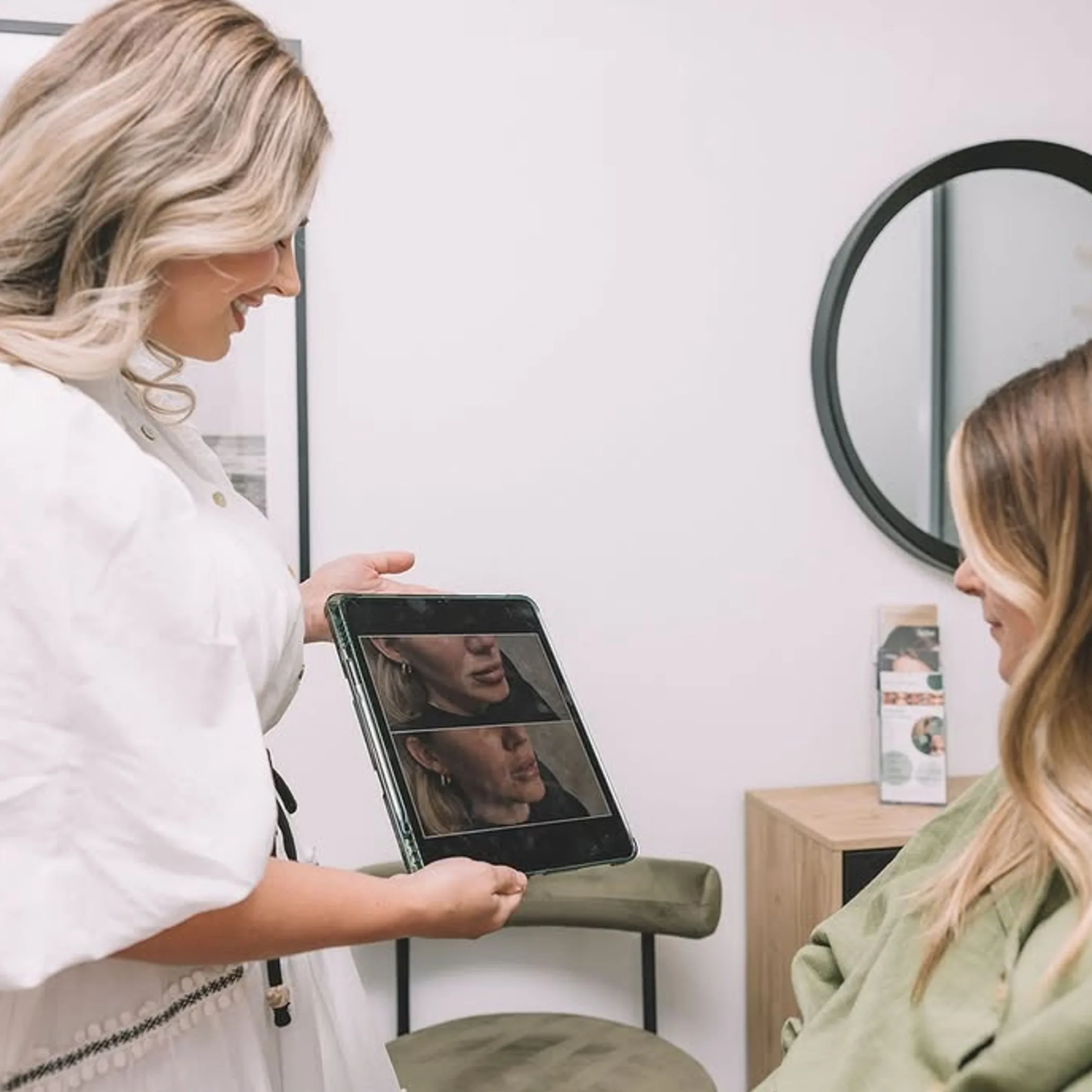 specialist consulting with client using facial images