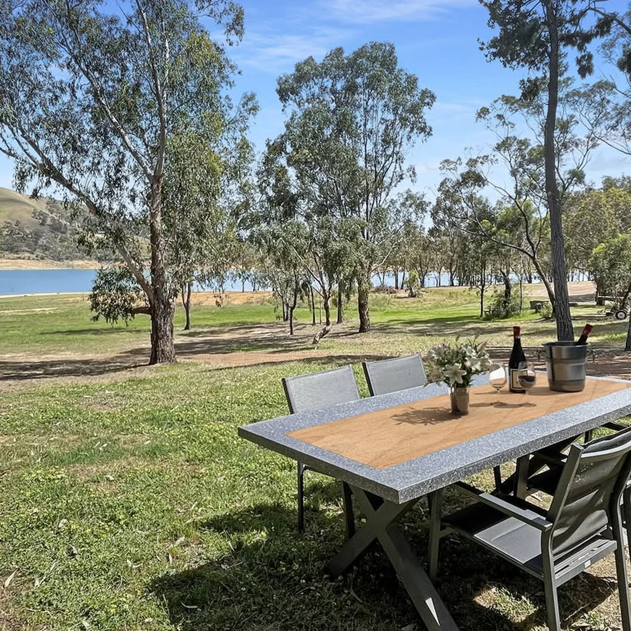 family enjoying an outdoor lake holiday