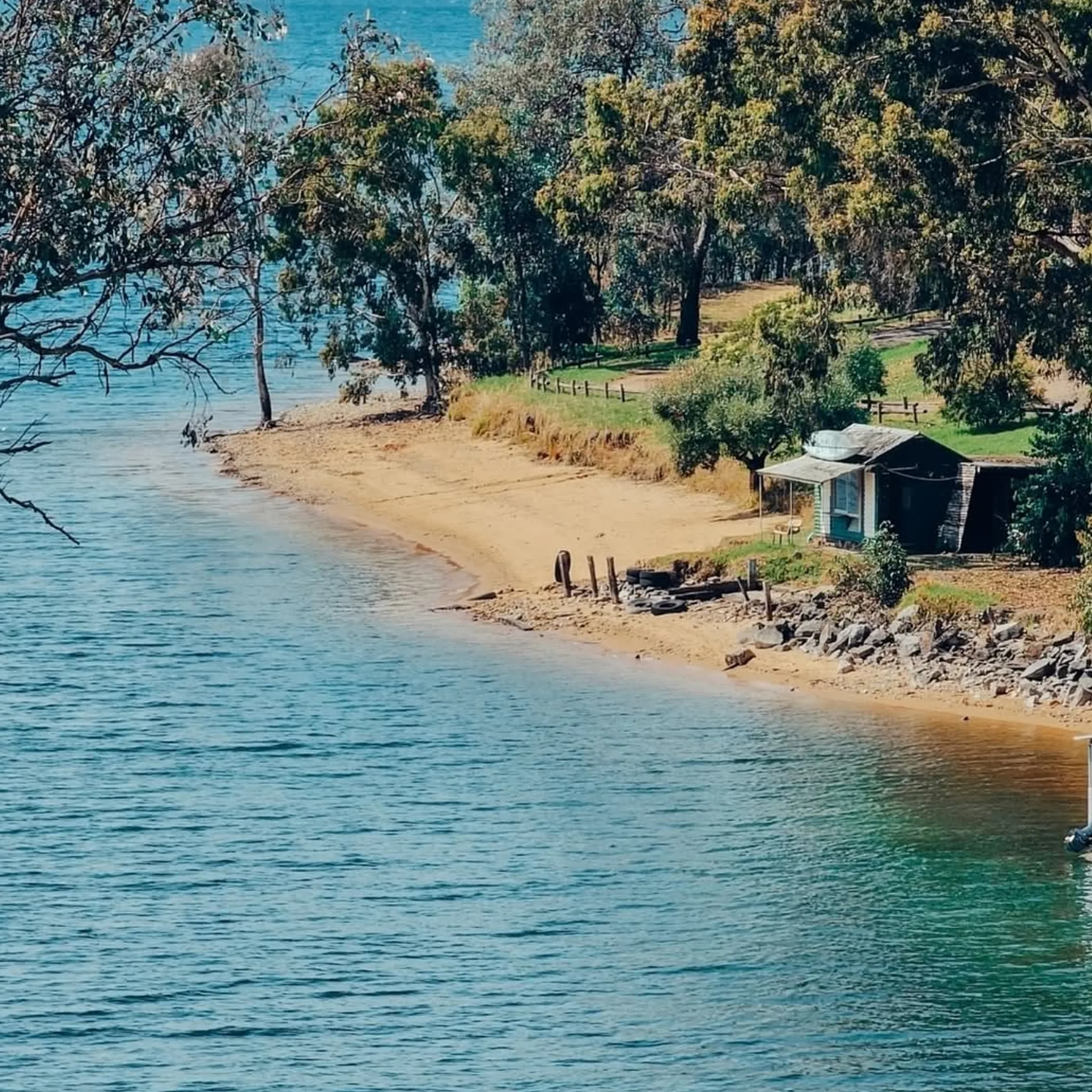 scenic lake shoreline with shelter